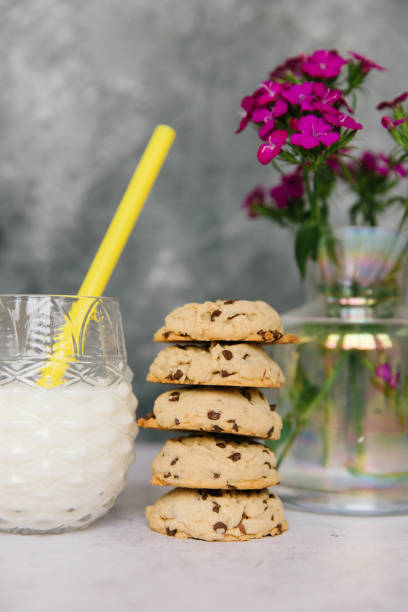 A stack of cookies with milk stock photo