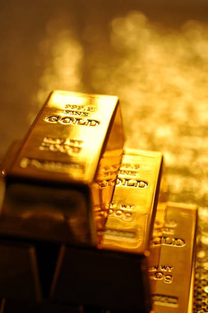 Stack of gold bars http://www.gunaymutlu.com/iStock/GOLD_Banner.jpg gold bar stock pictures, royalty-free photos & images