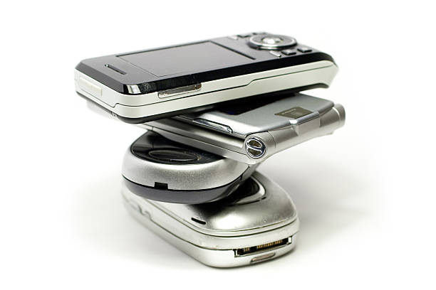 Stack of mobile phones stock photo