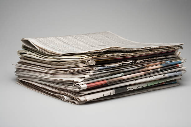 A stack of morning business papers stock photo