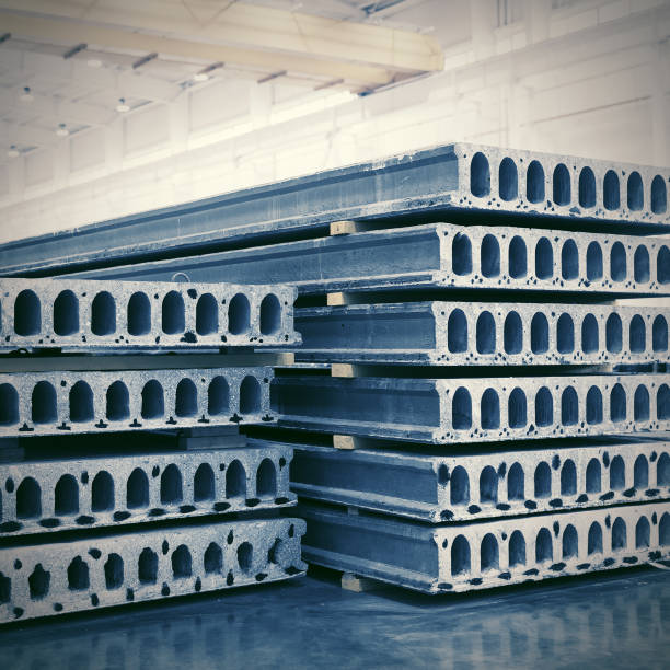 Stack of precast reinforced concrete slabs in factory workshop stock photo