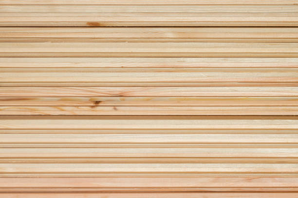 Stacked pine slats used for wainscoting. Pine wall panelling stock photo