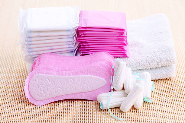 Stacks of a variety of pads and tampons stock photo