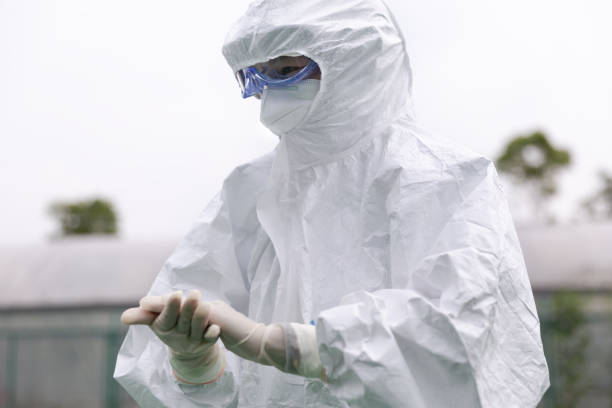 CDC staff with Protective Workwear. stock photo