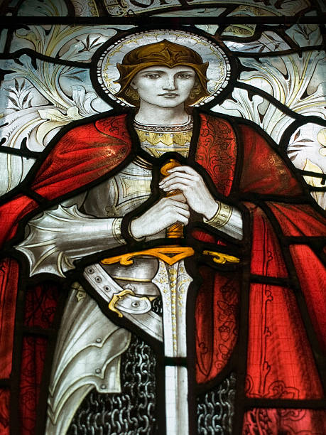 A stained glass portrait of Joan of Arc "Joan of Arc, or in French Jeanne d'Arc or Jehanne d'Arc. Also known as The Maid of Orleans." armour of god stock pictures, royalty-free photos & images