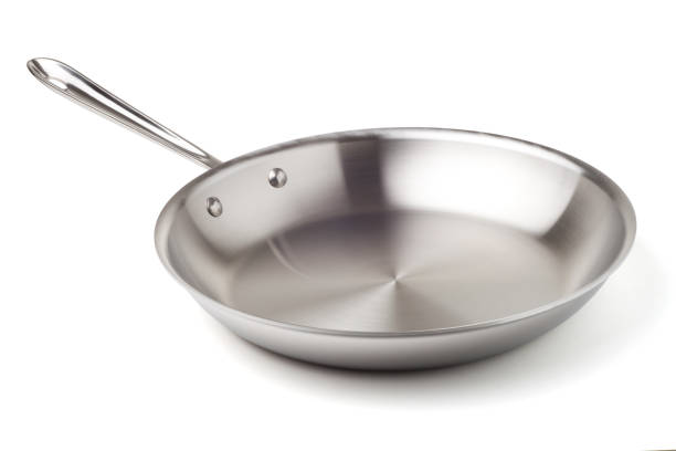 Stainless steel frying pan stock photo