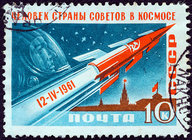 USSR stamp shows Rocket, Gagarin and Kremlin (1961) stock photo