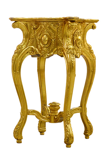 Stand for a vase, sideboard or coffee table in the Baroque style. Classic golden furniture isolated.