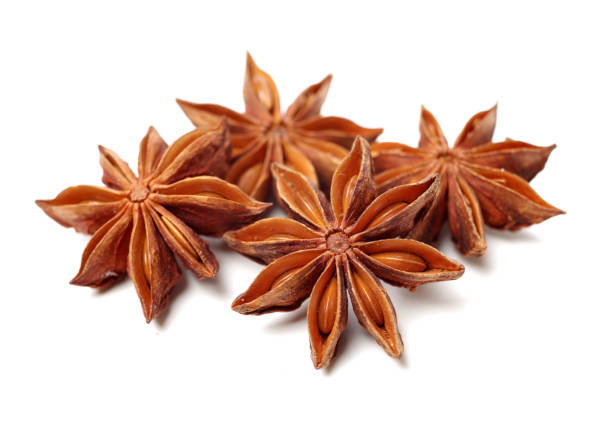 star anise on white background star anise on white background anise stock pictures, royalty-free photos & images