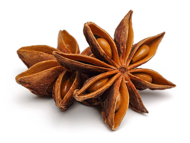 Star Anise Star anise on a white background anise stock pictures, royalty-free photos & images