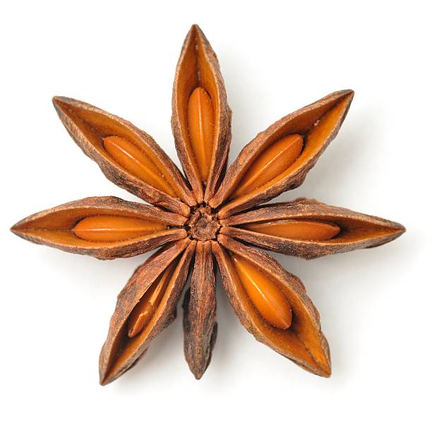 Star anise pod Star anise pod isolated on a white background. anise stock pictures, royalty-free photos & images