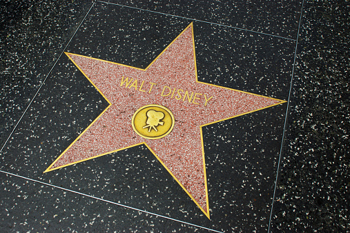 Hollywood, USA - April 18, 2014: Walt Disney star on Hollywood Walk of Fame in Hollywood, California. This star is located on Hollywood Blvd. and is one of over 2000 celebrity stars embedded in the sidewalk.