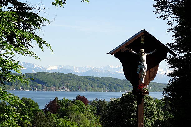 Starnberger See, Jesus on crucifix in foreground stock photo