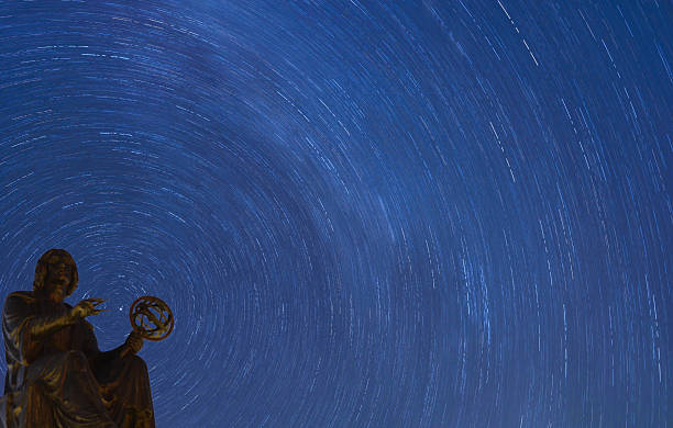 Stars rotating behind Copernicus monument, Chicago stock photo