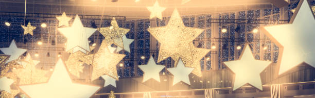 Stars shape show celebrity background  with spotlights soffits   vintage yellow golden colors as stage performance background stock photo