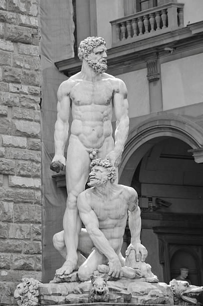 Statue of Hercules and Cacus in Piazza della Signoria, Flo Florence, Italy is known as the birthplace of the Renaissance.  Founded in 80 B.C. by Lucius Cornelius Sulla as a settlement for his soldiers, it was named Fluentia, which later became Firenze.  Renown artists like Michelangelo, Leonardo da Vinci, Botticelli and Donatello all lived, studied and worked in Florence, along with architects like Brunelleschi, who designed the dome of the city's duomo, Cattedrale di Santa Maria del Fiore.  Florence has a colorful history as a political and financial center, dominated for over 150 years by the Medici family and is also known as a fashion center.  Today, it's rich heritage in art can be enjoyed at several galleries and museums including the Uffizi and the Gallerie dell'Accademia, as well as the Pitti Palace (Palazzo Pitti).  Pictured here is the statue of Hercules and Cacus, sculpted by Baccio Bandinelli between 1525 and 1534.  He was commissioned by the Medici, but work was interrupted when the Medici fell out of favor in Florence and were exiled from the city for a time. michelangelo artist stock pictures, royalty-free photos & images