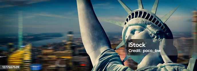 istock statue of liberty against Manhattan district 1277557539