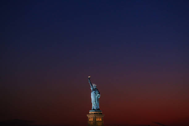 Statue of Liberty at dusk - New York City stock photo
