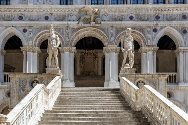statue of Neptune and Mars at the Giants Staircase at the Doges Palace (Palazzo Ducale) in Venice stock photo