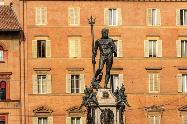 Statue of Neptune the Roman God in Bologna downtown Italy Bronze statue of Neptune (1566), Roman God, fountain in Piazza del Nettuno, Bologna downtown, Emilia-Romagna, Italy, Europe. Artist Giambologna (1529-1608) poseidon statue stock pictures, royalty-free photos & images