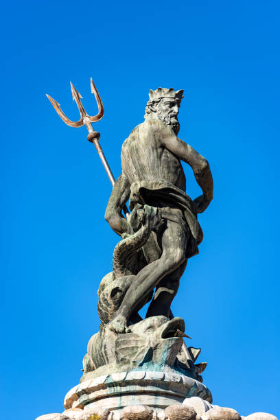 Statue of Neptune the Roman God - Trento Italy Closeup of the bronze statue of Neptune, Roman God, fountain in Piazza del Duomo (Cathedral square), Trento downtown, Trentino-Alto Adige, Italy, Europe poseidon statue stock pictures, royalty-free photos & images