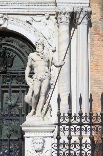 Statue of Poseidon in the front door of the Arsenal Statue of Poseidon in the front door of the Arsenal. Venice, Italy poseidon statue stock pictures, royalty-free photos & images