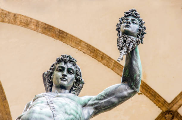 statue of the Italian Florentine Renaissance: the Perseus of Cellini florence statue in piazza della signoria, the italian florentine renaissance: the perseus of cellini michelangelo artist stock pictures, royalty-free photos & images