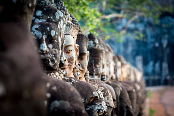 Statues at South gate Angkor Wat, Cambodia stock photo