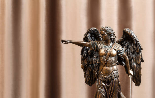 Statuette of the Archangel Michael on a velour background. Statuette of the Archangel Michael on a velour background. armour of god stock pictures, royalty-free photos & images