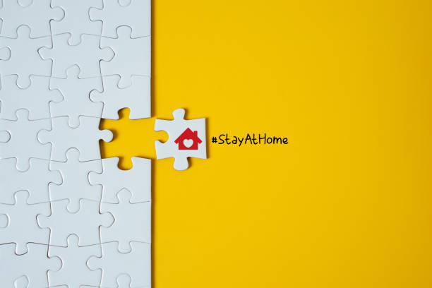 Stay at home. Jigsaw puzzle. stock photo
