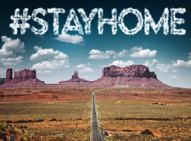 stay home concept sign at monument valley stay home concept sign on the sky navajo nation covid stock pictures, royalty-free photos & images