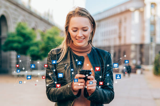Staying connected. Shot of a beautiful young woman receives notifications on smart phone. Social media and digital online concept. Social media and people network technology concept. online messaging photos stock pictures, royalty-free photos & images