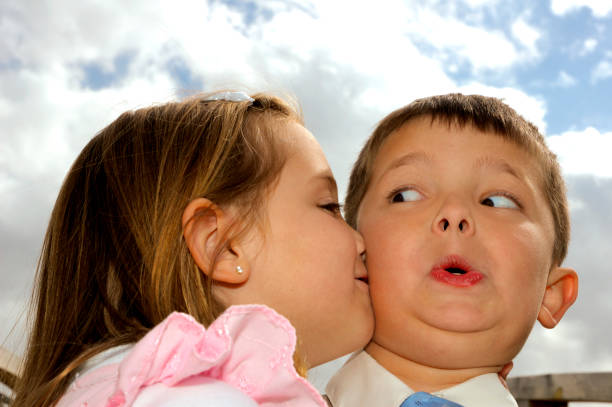 7,706 Boy Girl Kissing Stock Photos, Pictures & Royalty-Free Images - iStock
