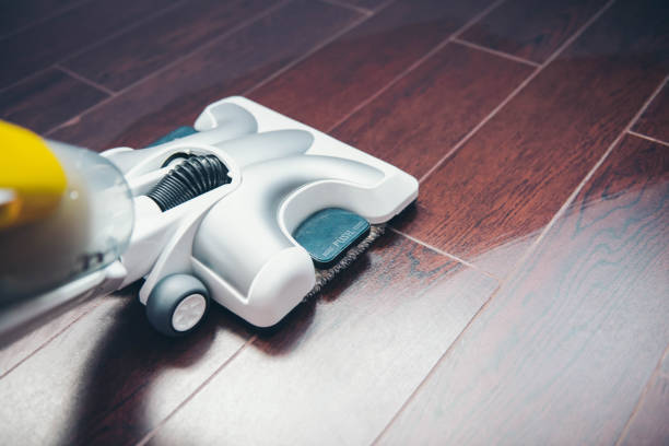 steam cleaner Cleaning the floor with a steam cleaner. electric mop stock pictures, royalty-free photos & images