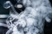 istock Steam patterns of smoking electronic cigarette or boiling water 1186715020