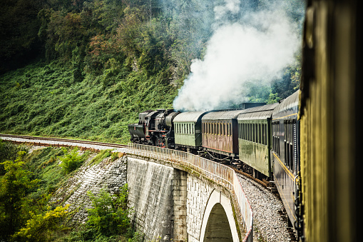 Steam train composition on touristic journey.