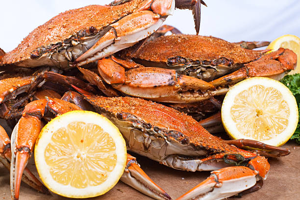Steamed Crabs  blue crab stock pictures, royalty-free photos & images