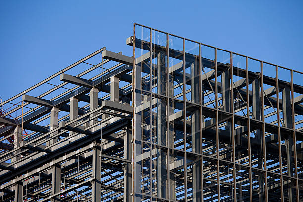 Steel structure from a building under construction on blue sky stock photo