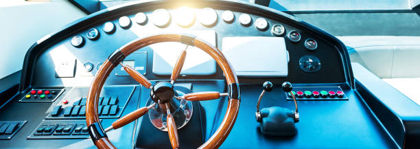 Steering wheel on luxury yacht stock photo