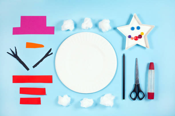 Step-by-step instruction of christmas snowman from a Paper Plate. Step 1. stock photo