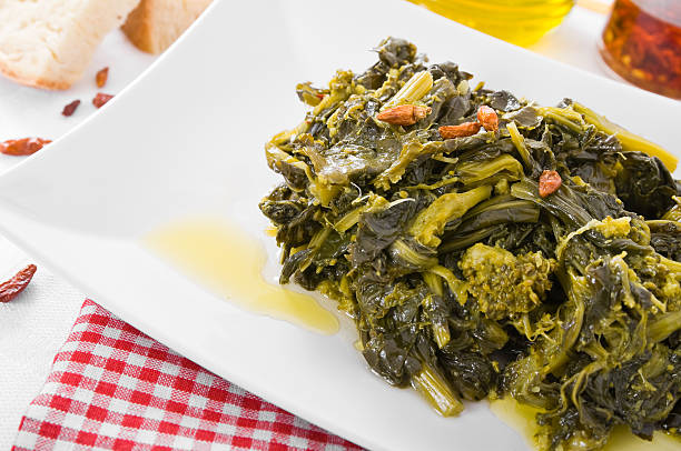 Stewed turnip greens. Turnitin check stock pictures, royalty-free photos & images