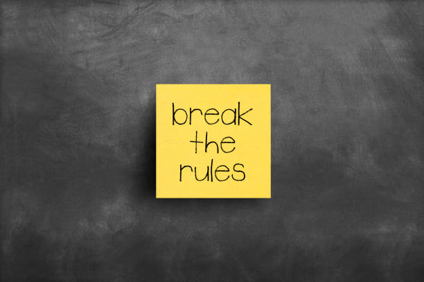 Sticky note on blackboard, Break the rules Sticky note on blackboard, Break the rules rule breaker stock pictures, royalty-free photos & images