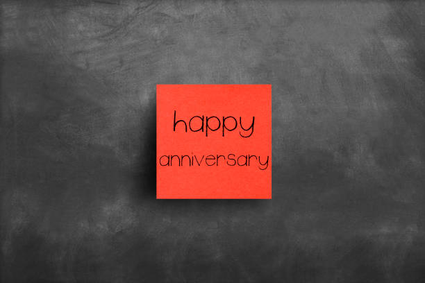 Sticky note on blackboard, Happy anniversary Sticky note on blackboard, Happy anniversary wedding anniversary stock pictures, royalty-free photos & images