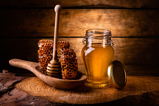 Still Life Acacia Honey In A Glass Jar Stock Photo - Download Image Now - iStock