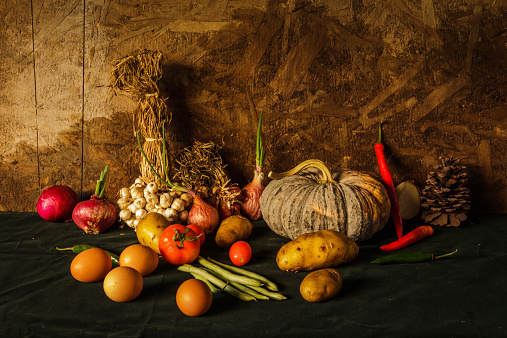 Still life photography with pumpkin, spices, herbs, vegetables and fruits. For cooking
