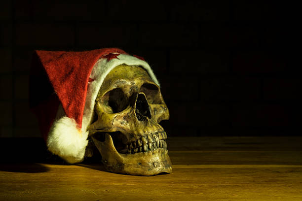 Still life with skull in christmas day, dark concept stock photo