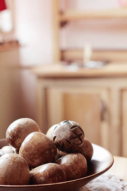Still Life with wooden nuts and play kitchen stock photo