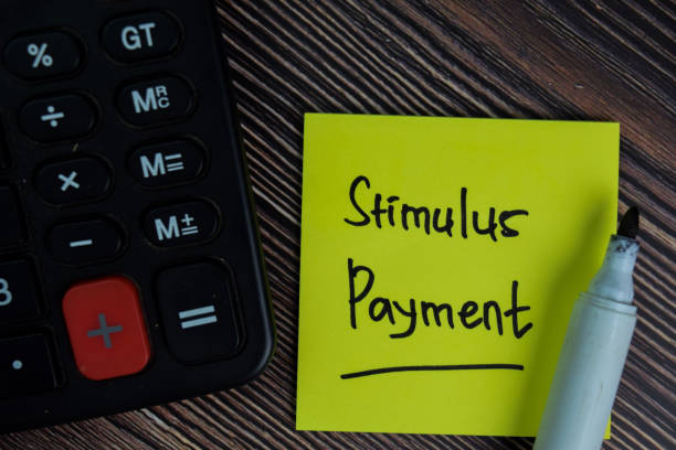 Stimulus Payment write on sticky notes isolated on office desk. Stimulus Payment write on sticky notes isolated on office desk. relief carving stock pictures, royalty-free photos & images