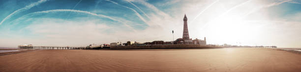 Stitched panorama of Blackpool from the beach at low tide on an unseasonably warm sunny February morning. Stitched panorama of Blackpool from the beach at low tide on an unseasonably warm sunny February morning. blackpool tower stock pictures, royalty-free photos & images