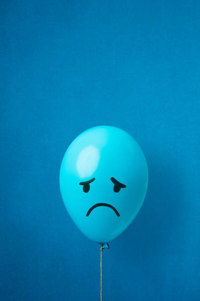 Stock photo of a blue monday balloon on a blue background stock photo
